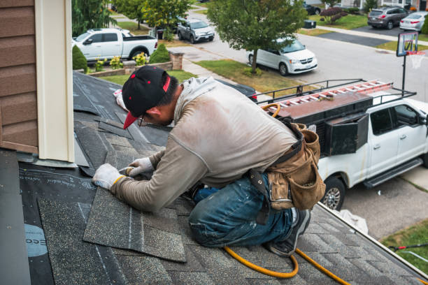 Professional Flat Roof Repair technician working in Freeport, OH